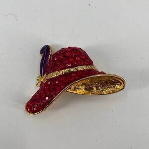 Red hatter gem encrusted pin